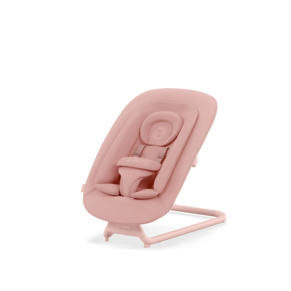 Close-up of the Cybex Lemo 2 Bouncer in pink, padded seat with 5-point harness strapped to a curved pink metal stand.