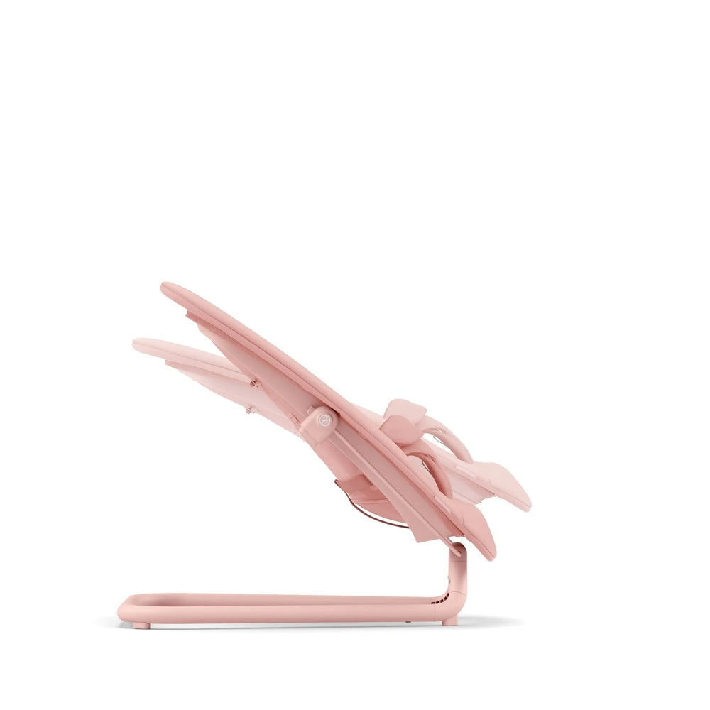 Close-up of the Cybex Lemo 2 Bouncer in soft pink fabric, compact frame with adjustable reclining seat shown in use.