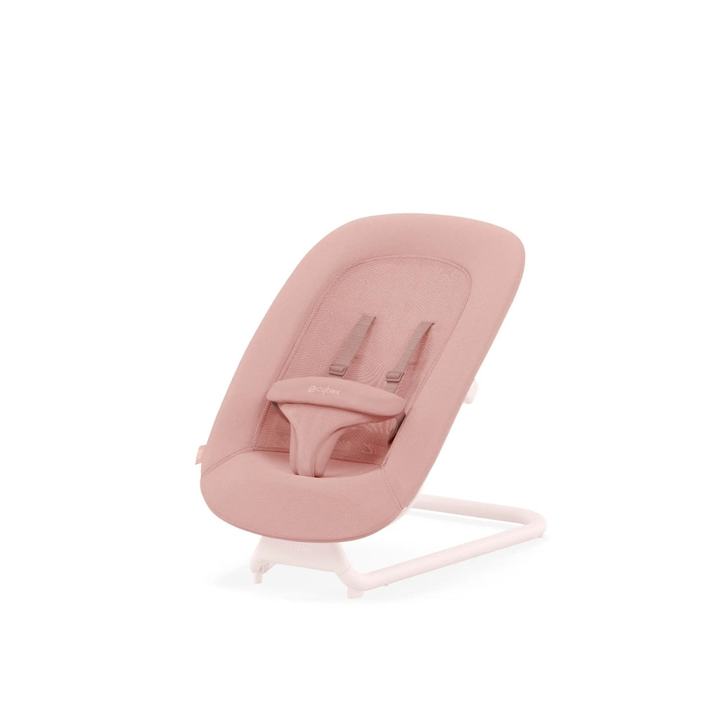 Close-up of the Cybex Lemo 2 Bouncer in soft pink fabric with padded seat and safety harness on a rocking frame.
