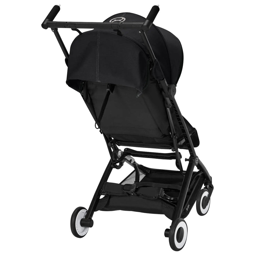 Close-up of the Cybex Libelle Stroller in black with a lightweight frame and large wheels ready to roll.