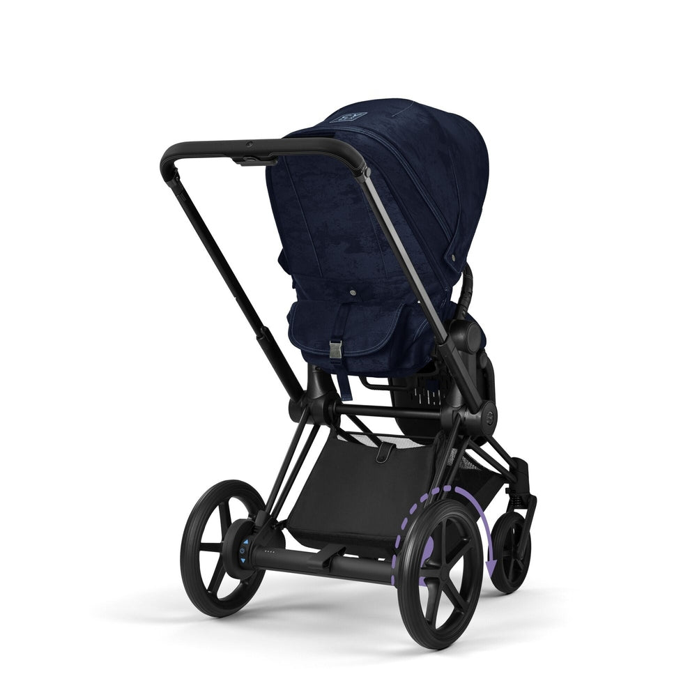 Close-up of the Cybex Platinum e-Priam 4 Stroller Limited Edition - Rebellious Luxury Denim Blue in navy denim-blue with black frame and large rear wheels.