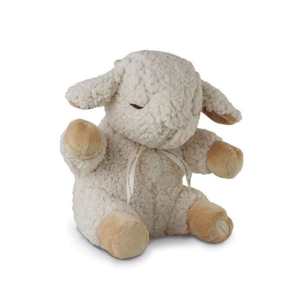 Cloud B Sleep Sheep On The Go plush toy in cream fleece with tan hooves, sitting with eyes closed.