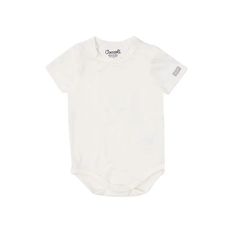 Coccoli Infant Cotton TENCELTM Modal Romper Cream, flat lay with short sleeves and snap bottom.