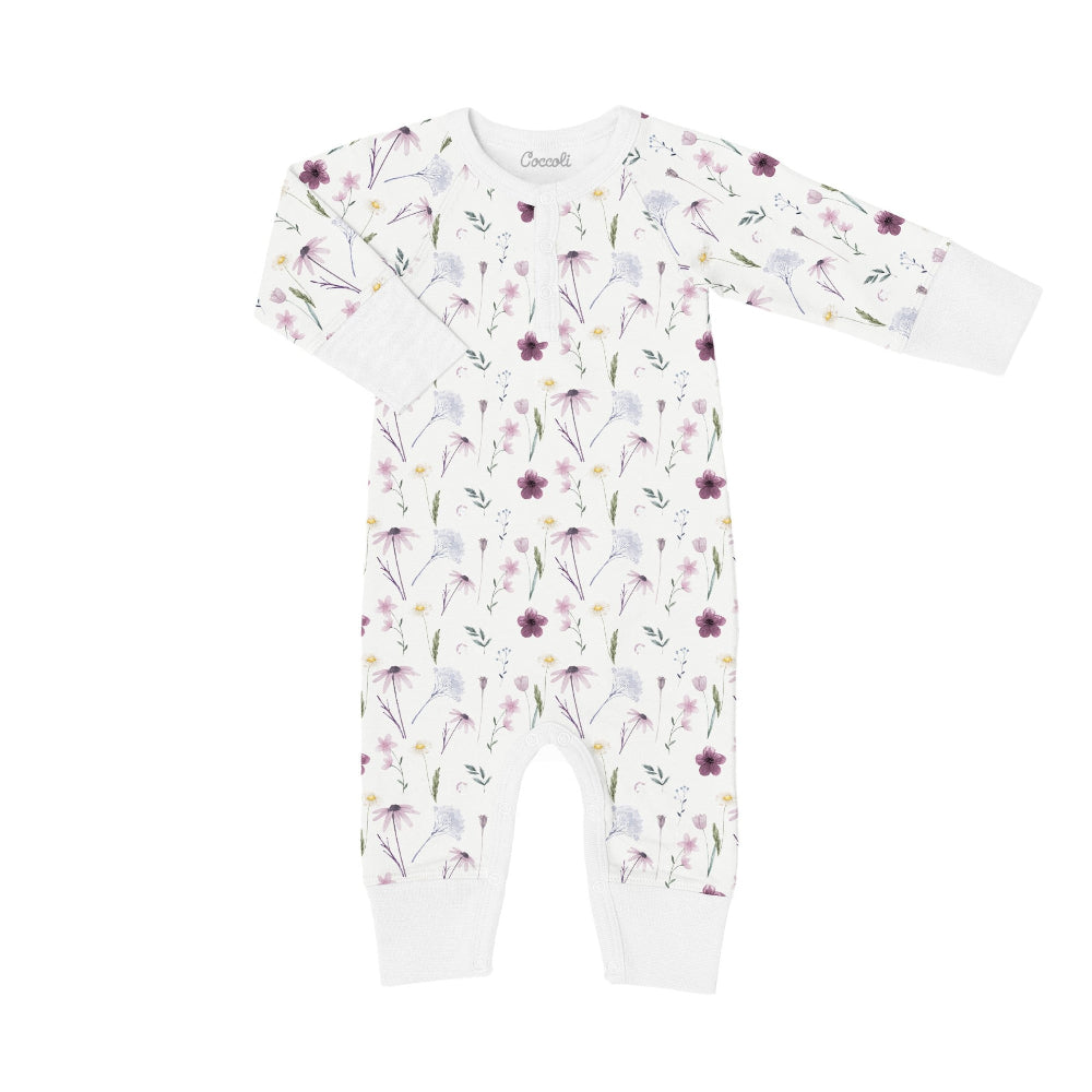 Coccoli infant floral unionsuit in cream with a cotton TENCEL Modal blend and pink/purple flowers