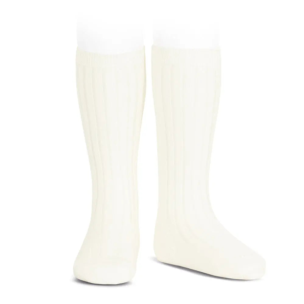 Condor Basic Rib Knee High Socks Beige worn on legs, showcasing ribbed knit warmth.