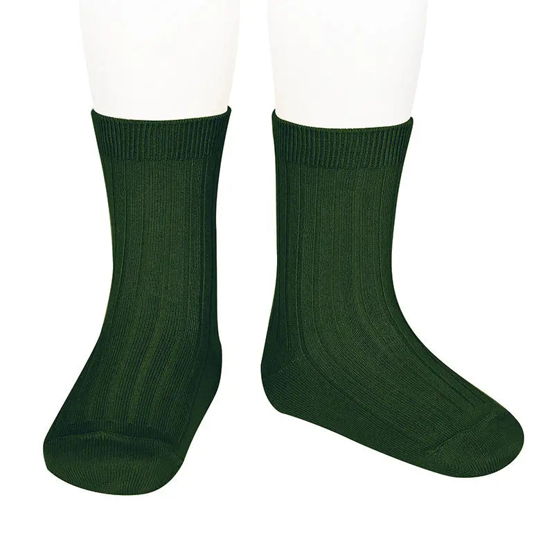 Condor Basic Rib Short Socks Bottle Green on feet, ribbed knit pair.
