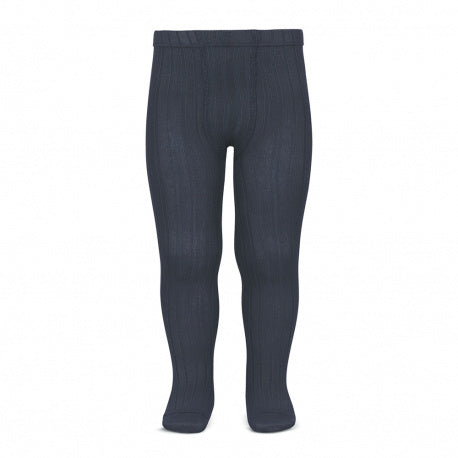 Condor Basic Rib Tights Carbon Coal on baby's legs in navy ribbed knit for snug warmth.
