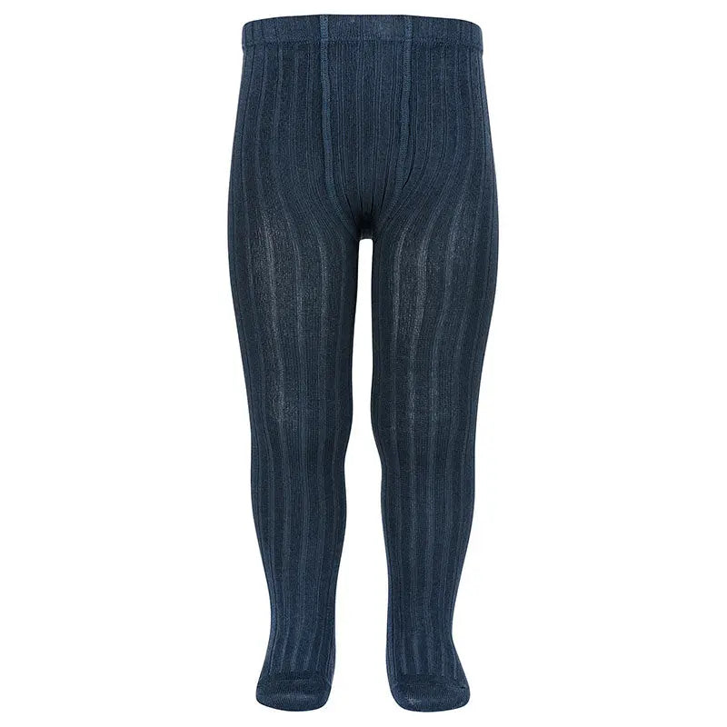 Condor Basic Rib Tights Lapis for babies in dark blue ribbed knit worn on small legs.