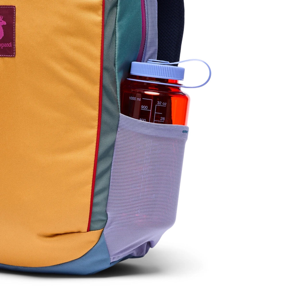 Cotopaxi Allpa 18L Daypack in Yellow/Teal/Purple with side mesh bottle pocket