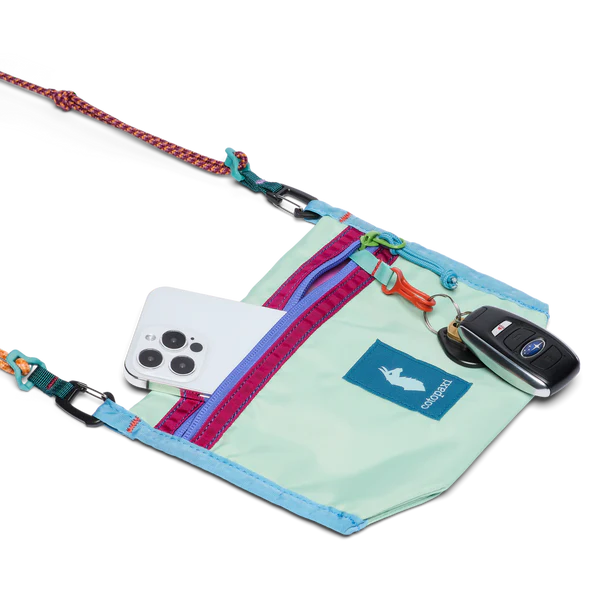 Cotopaxi Lista 2L Crossbody Bag in Mint Green with Purple Zipper and Teal Strap