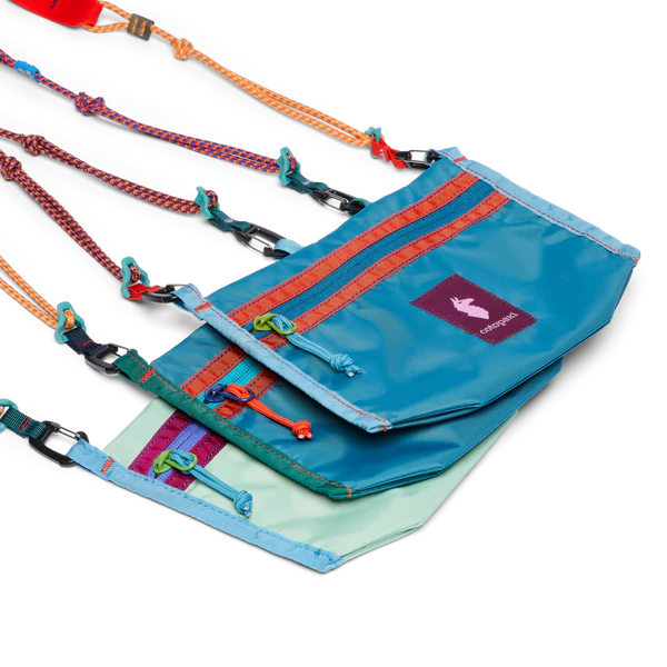 Cotopaxi Lista 2L Crossbody Bag in Blue with orange zipper and braided paracord straps