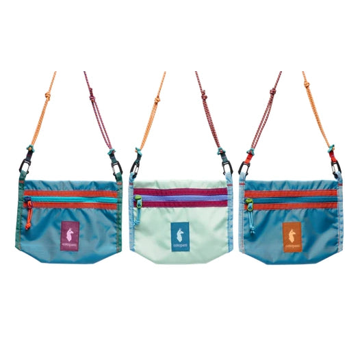 Cotopaxi Lista 2L Crossbody Bag in teal with orange zipper and strap; mint with purple zipper; blue with orange zipper