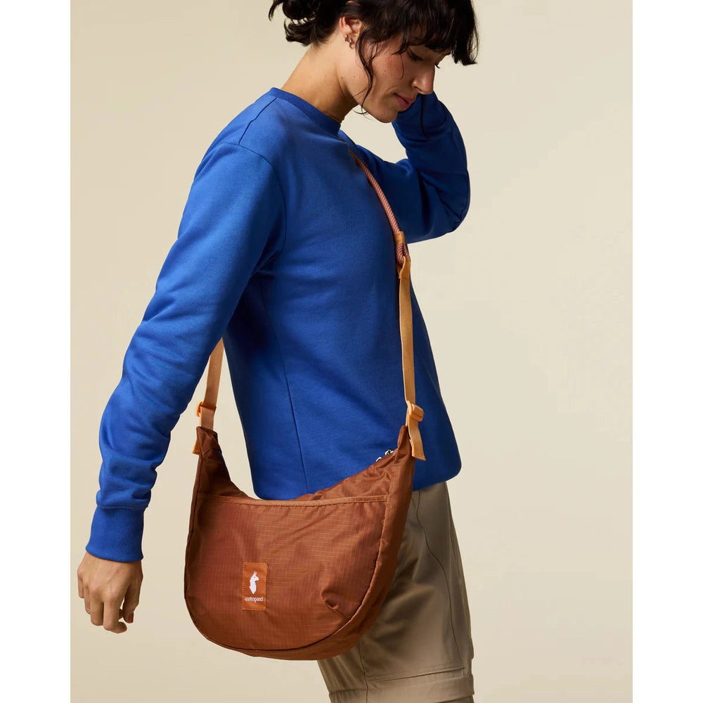 Cotopaxi Trozo 8L Shoulder Bag Cada Dia in Terracotta with tan strap
