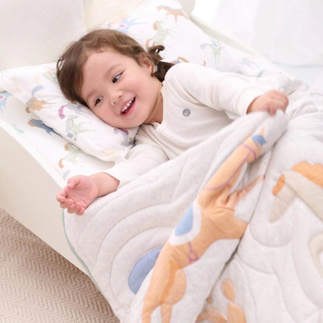 Nest Designs Cotton Jersey Nook Embroidered Quilted Cozy Blanket Small Pony Express — lifestyle