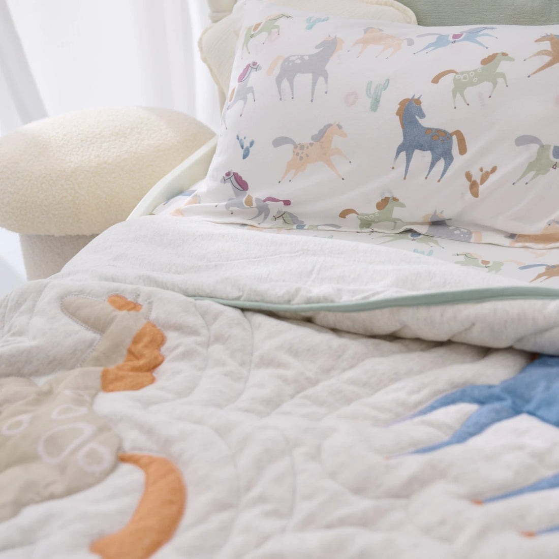 Nest Designs Cotton Jersey Nook Embroidered Quilted Cozy Blanket Small Pony Express — lifestyle