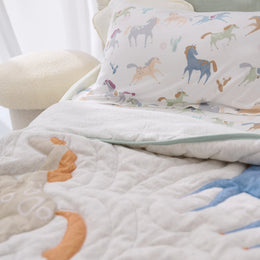 Nest Designs Nook Embroidered Quilted Cozy Blanket 2.0 TOG Small Pony Express