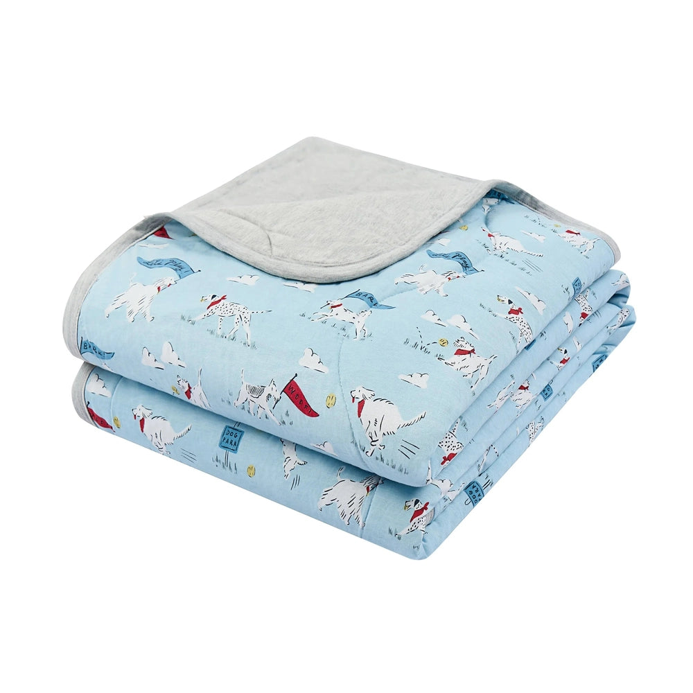 NEST DESIGNS Nest Designs Bamboo Jersey Quilted Cozy Blanket Medium Puppy Park reversible with gray backing and quilted stitching img 1/7