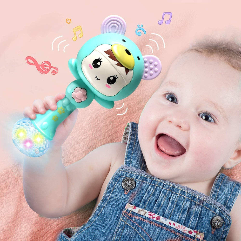 Cute Stone rattle and teether set; turquoise toy with light-up LED ball and smiling character head