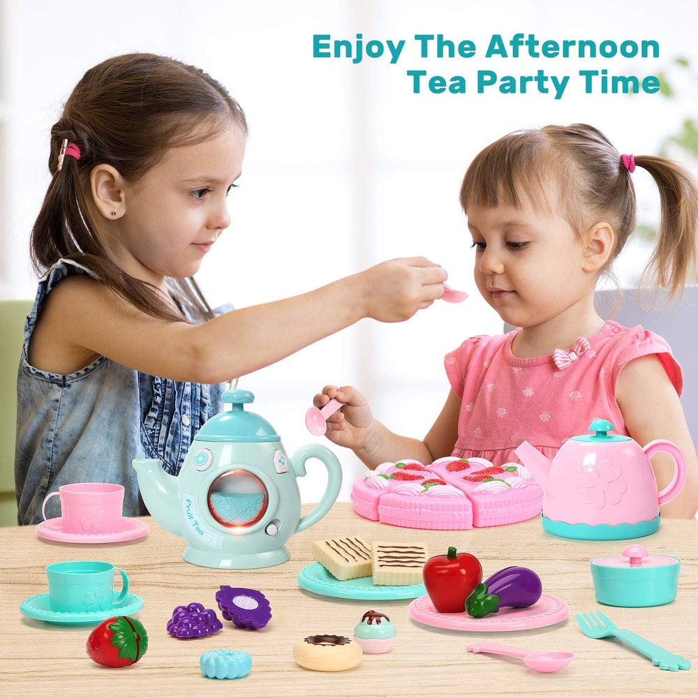 Cute Stone Tea Party Pretend Play Set by CUTE STONE; pastel teal and pink teapots with assorted play pastries