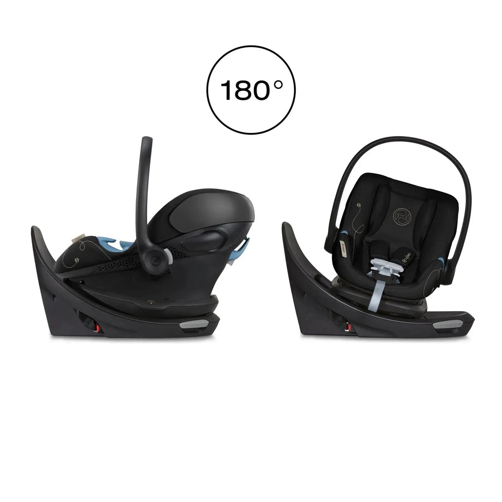 Close-up of the Cybex Aton G Swivel Sensorsafe Infant Car Seat in black with base and carry handle, shown in swivel-ready setup.