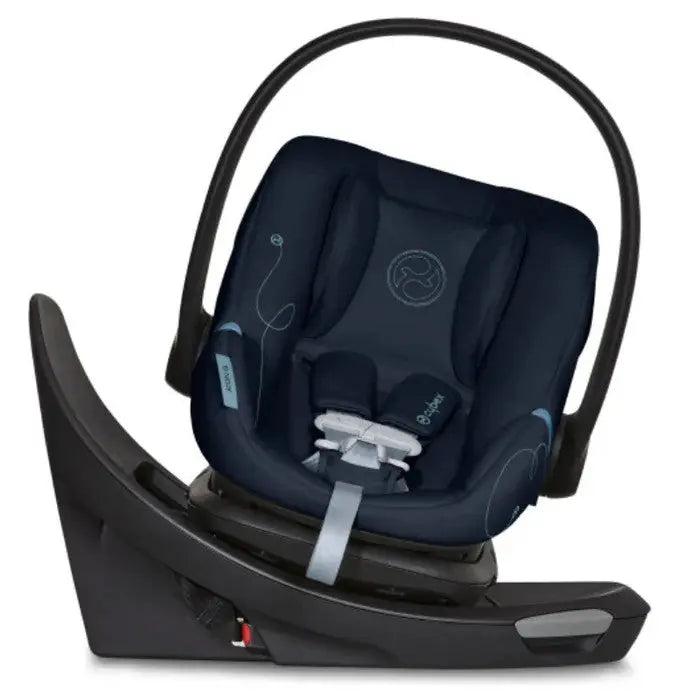 Studio product image of the Cybex Aton G Swivel Sensorsafe Infant Car Seat in navy, shown mounted on its base with sensorsafe harness.