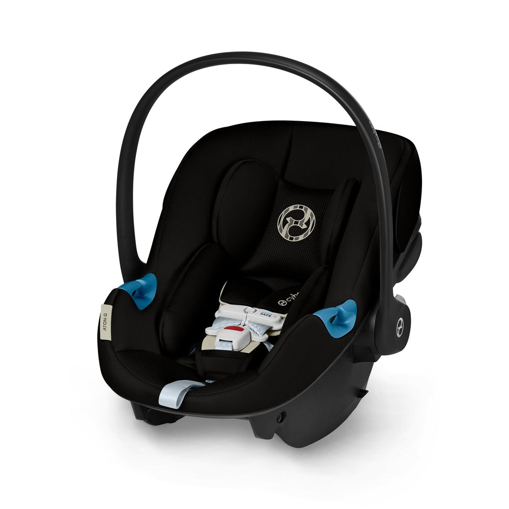 Close-up of the Cybex Aton G Swivel Sensorsafe Infant Car Seat with curved carrying handle, blue accent levers, and padded harness.