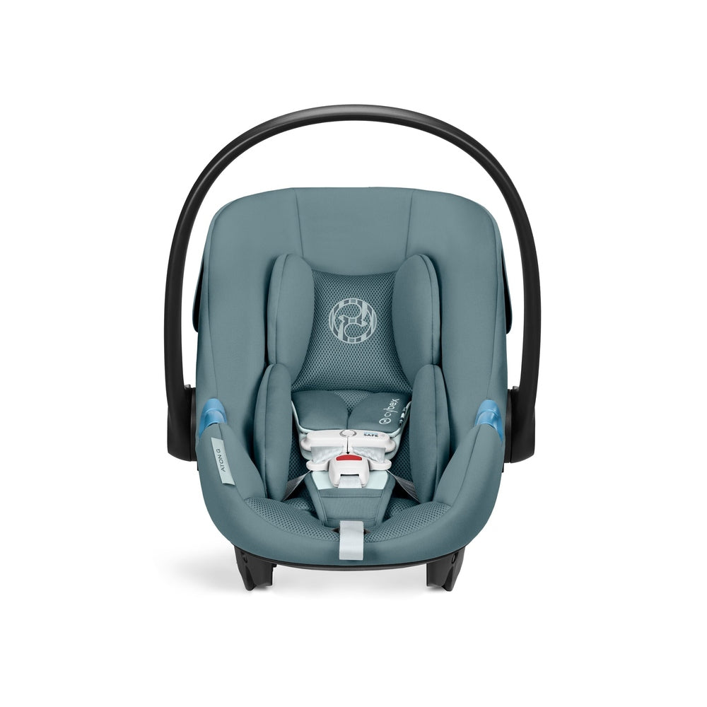 Close-up of the Cybex Aton G Swivel Sensorsafe Infant Car Seat in teal with curved black handle and breathable mesh padding.