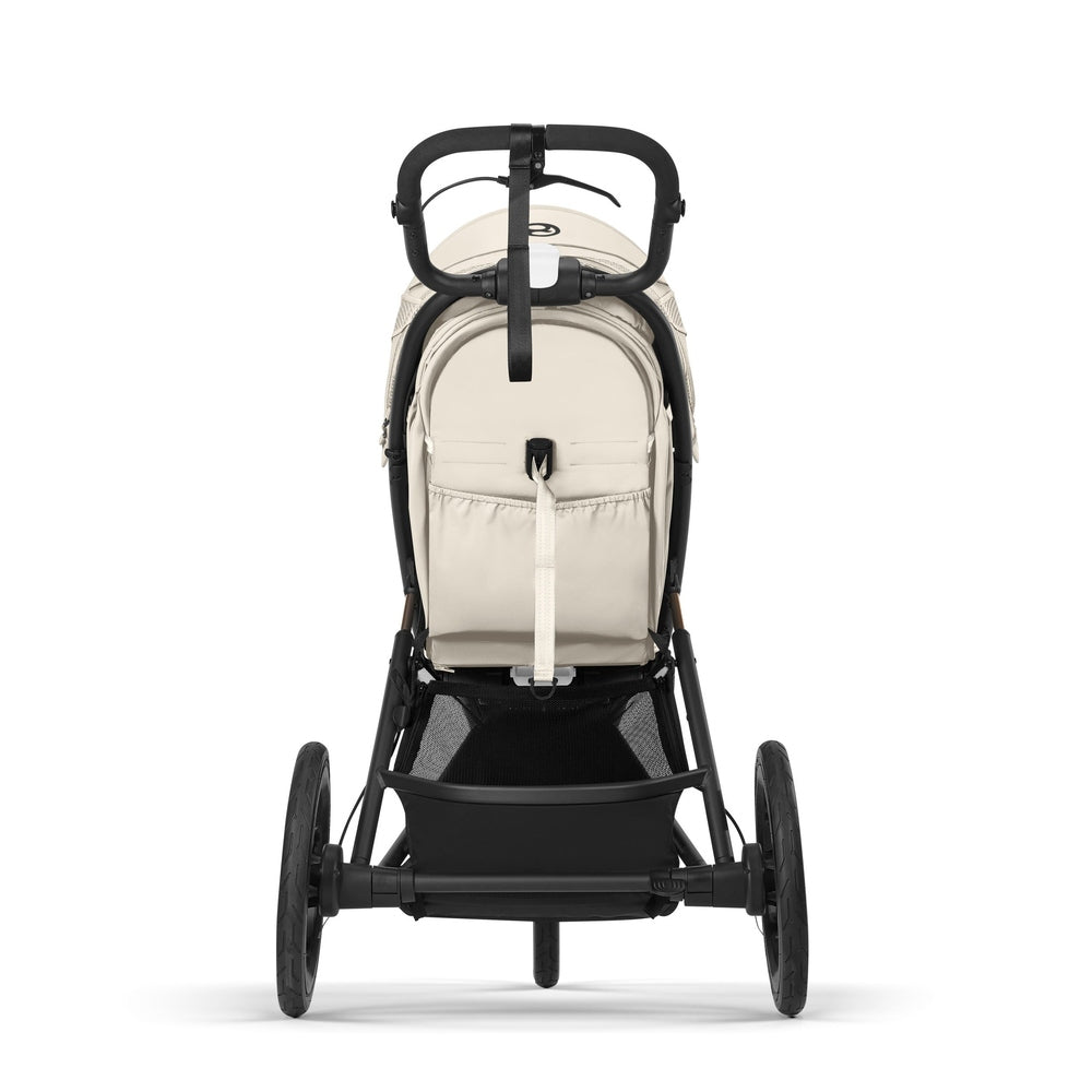 Close-up of the Cybex Avi Spin All Terrain Stroller in beige, black frame, three-wheel jogger shown from rear.