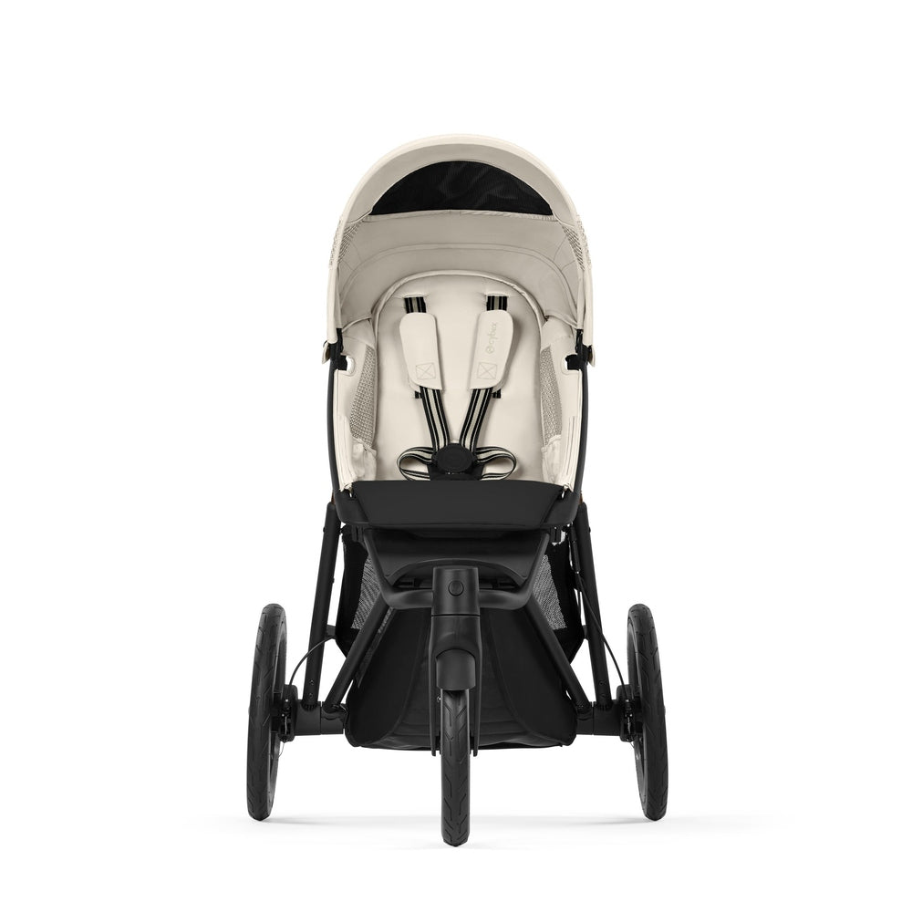 Close-up of the Cybex Avi Spin All Terrain Stroller in beige seat with black frame, three-wheel jogger ready for off-road adventures.
