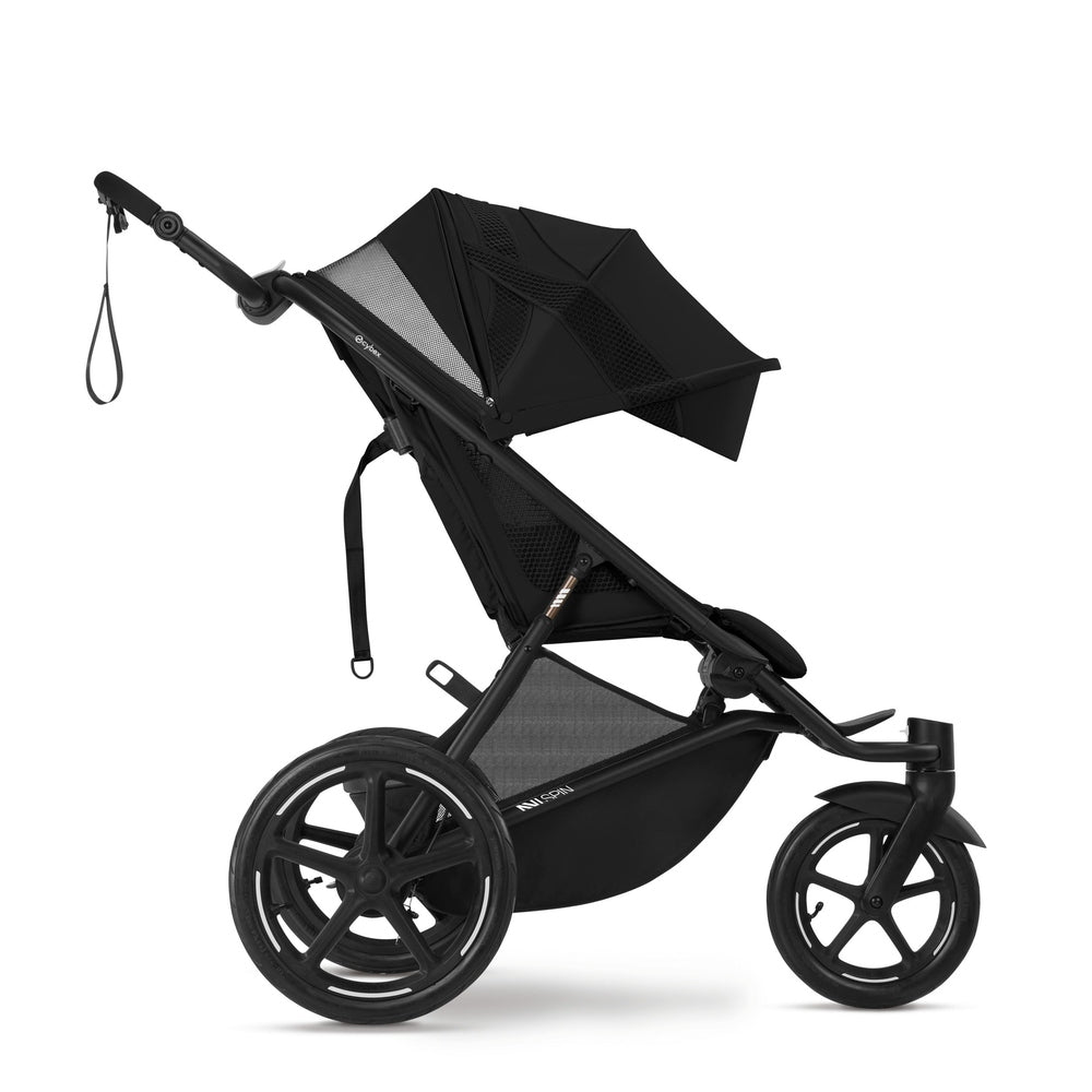 Close-up of the Cybex Avi Spin All Terrain Stroller in black with three wheels and expandable canopy, ready to roll.