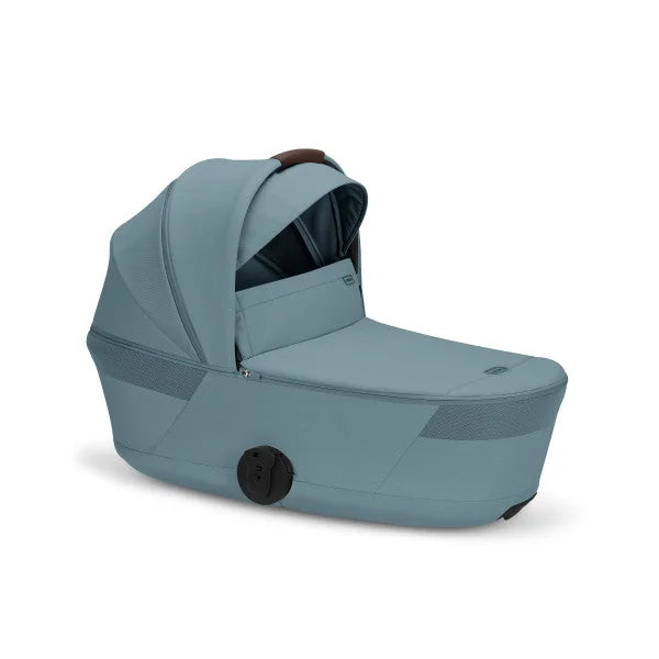 CYBEX Balios Fold Cot in Stormy Blue, front three-quarter view