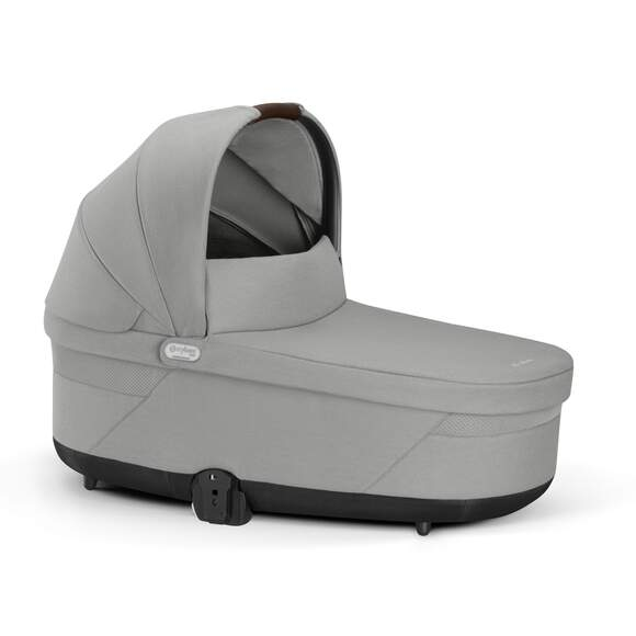 Studio product image of the Cybex Balios S Lux Cot in light grey, front three-quarter view on a white background.