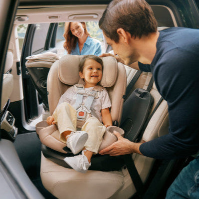 Feature graphic showing the Cybex Callisto G 360 Rotating All-In-One Convertible Car Seat in beige upholstery being installed in car.