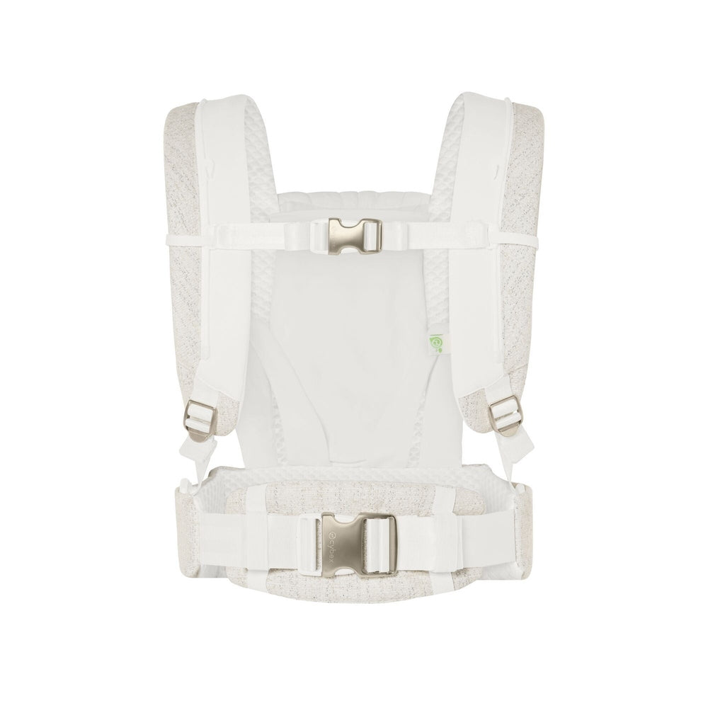 Close-up of the Cybex Coya Carrier Boucle with beige boucle sides and silver buckles.