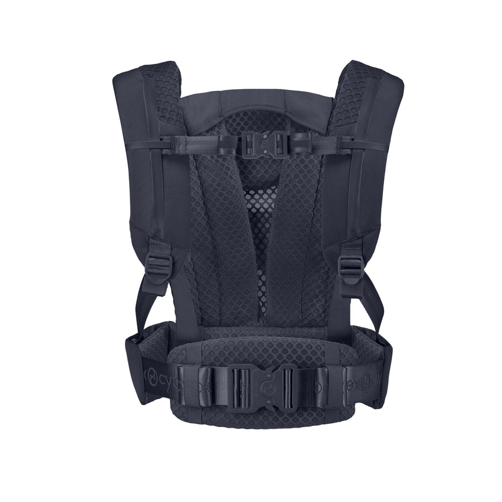 Close-up of the Cybex Coya Carrier dark navy cybex coya carrier back view with padded shoulder straps, breathable mesh back panel, and waist belt with buckle.