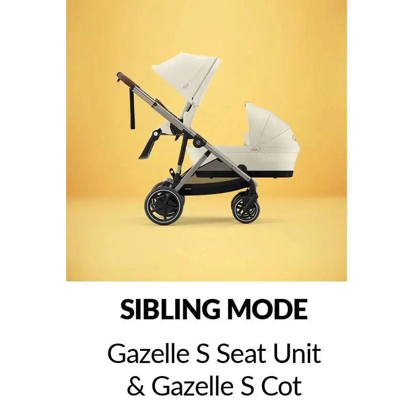 Close-up of the Cybex E-Gazelle S Stroller in white with black chassis, being pushed to showcase large wheels and smooth maneuverability.