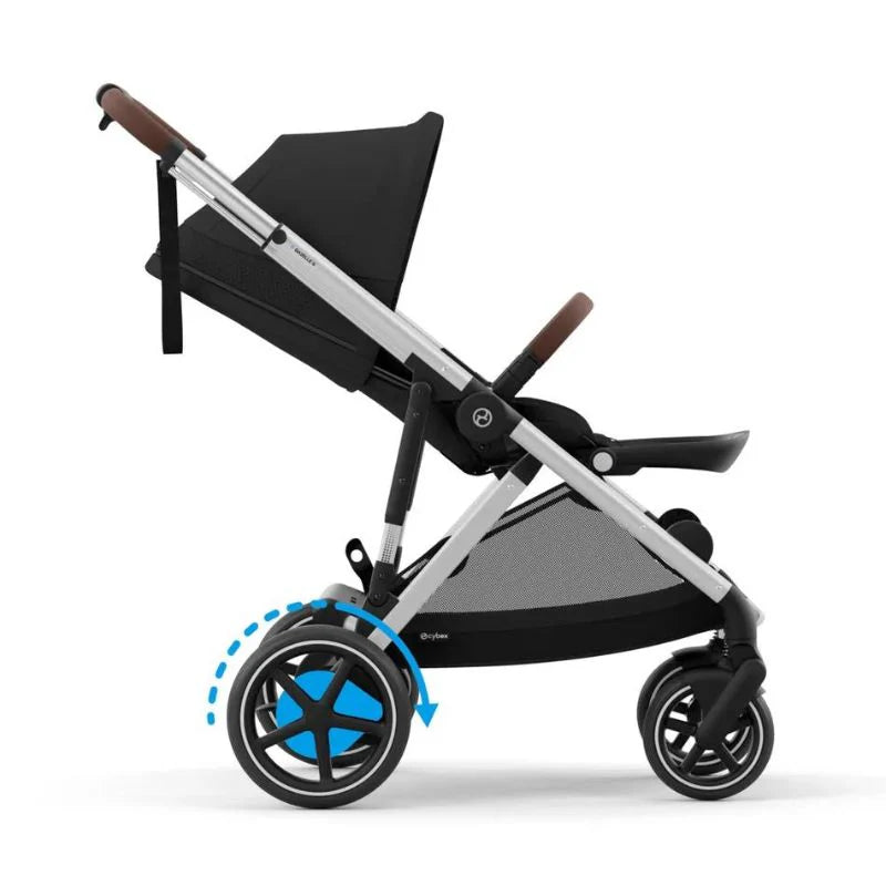 Close-up of the Cybex E-Gazelle S Stroller silver frame with brown handles and black seat; rear wheel rotates to show easy mobility.