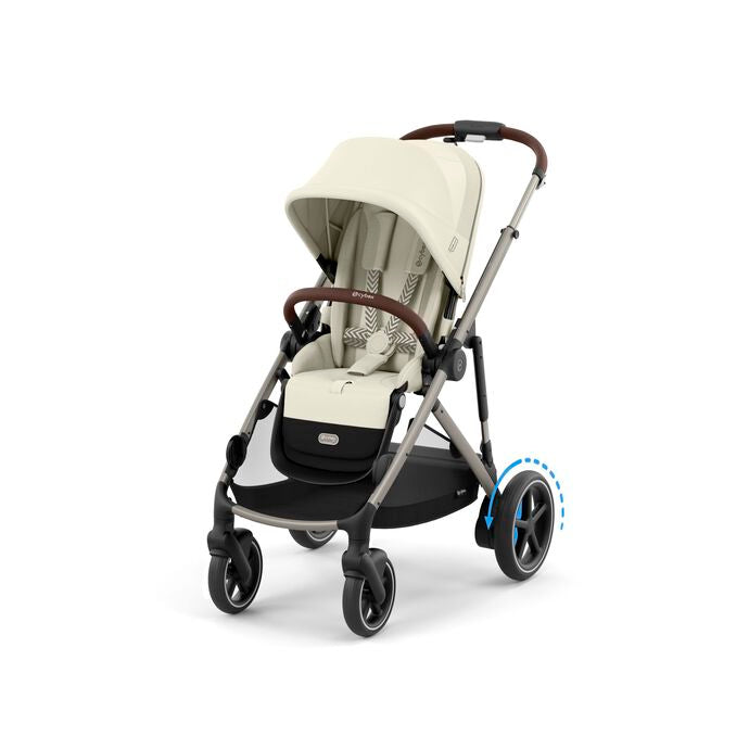 Close-up of the Cybex E-Gazelle S Stroller in cream with brown faux-leather handlebar, ready to roll on large rear wheels.