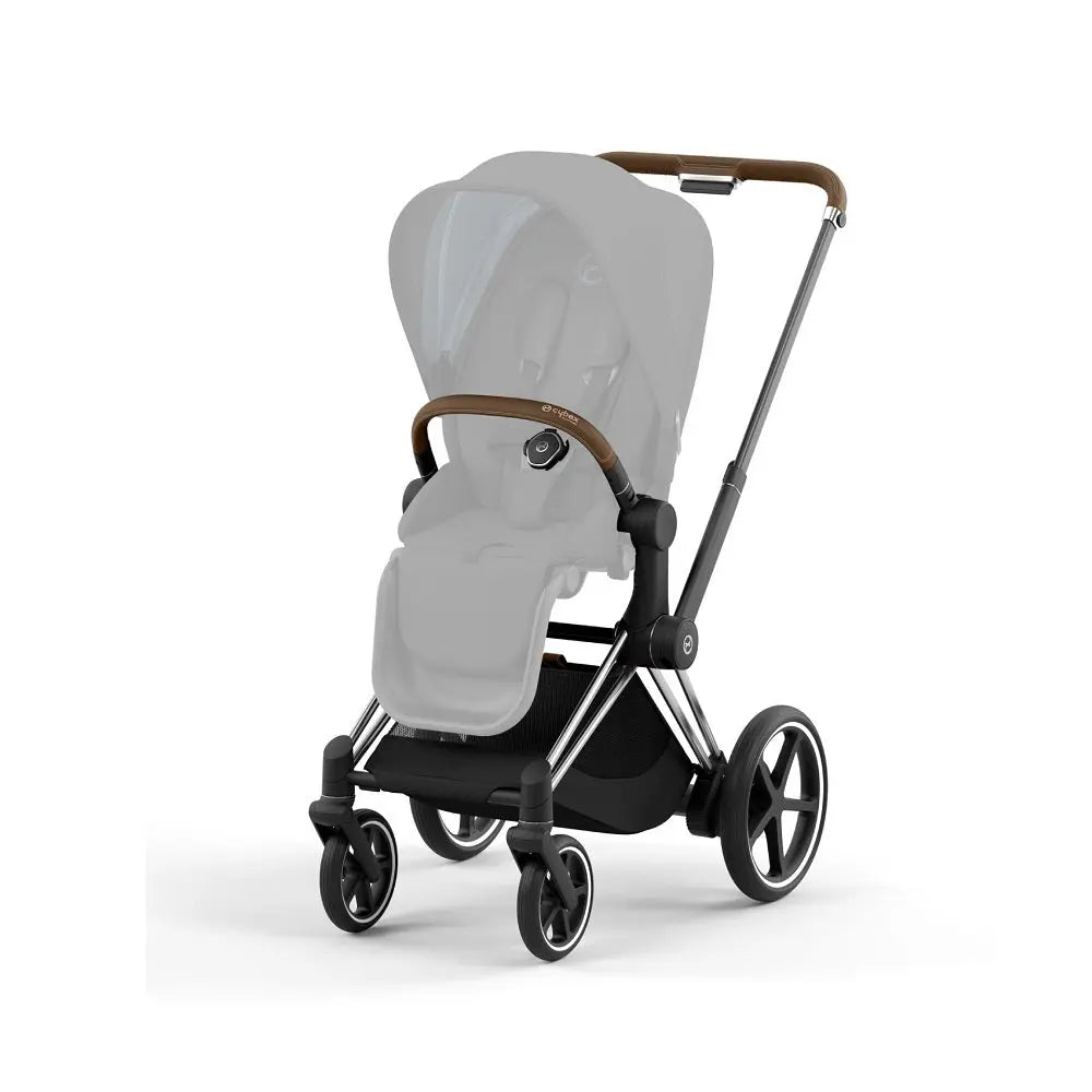 Close-up of the Cybex E-Priam 4 Frame stroller in gray with brown leather accents, showing an extended canopy and large wheels.