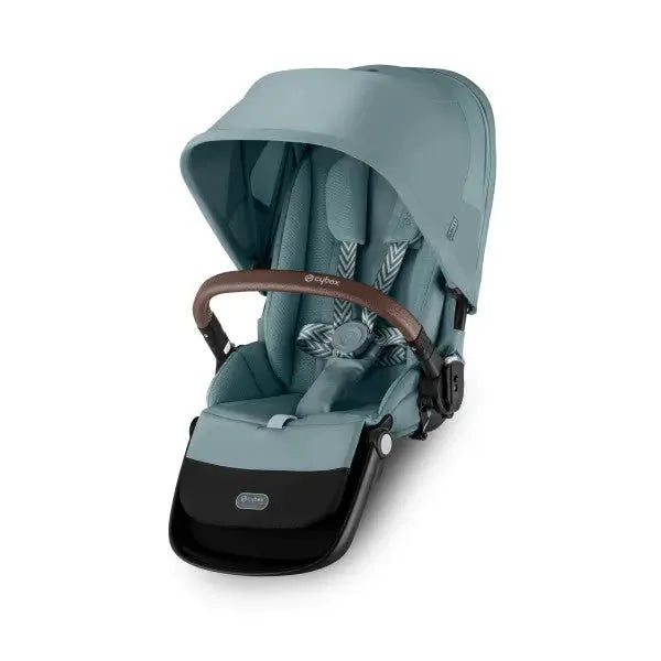 Close-up of the Cybex Gazelle S V2 Toddle Seat in teal with brown leather handle and extended canopy.
