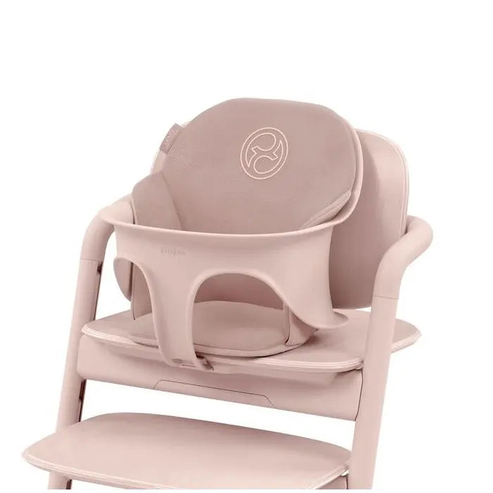 Studio product image of the Cybex Lemo 2 Comfort Inlay with high chair beige insert attached to chair, providing plush head and body support.