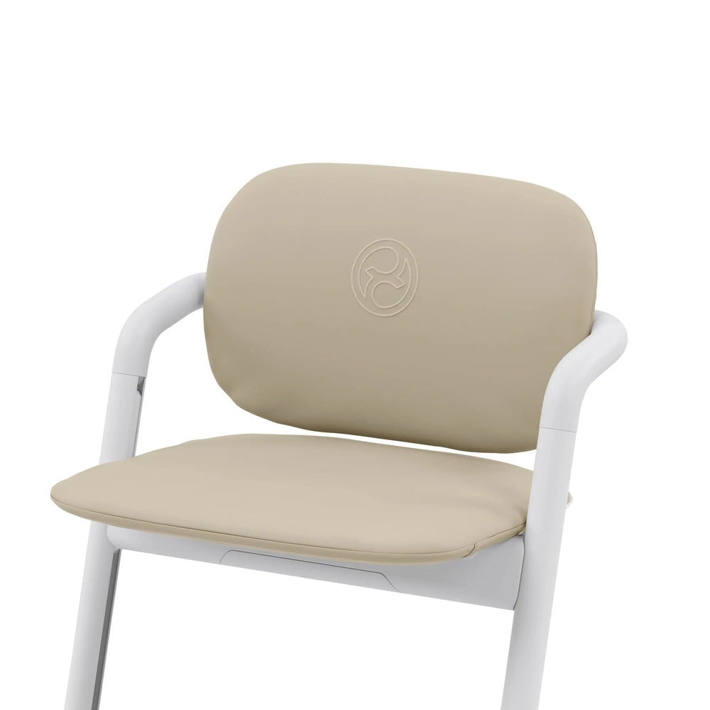 Lifestyle image of the Cybex Lemo 2 Comfort Inlay beige high-chair cushion mounted on a white frame, enhancing baby comfort.
