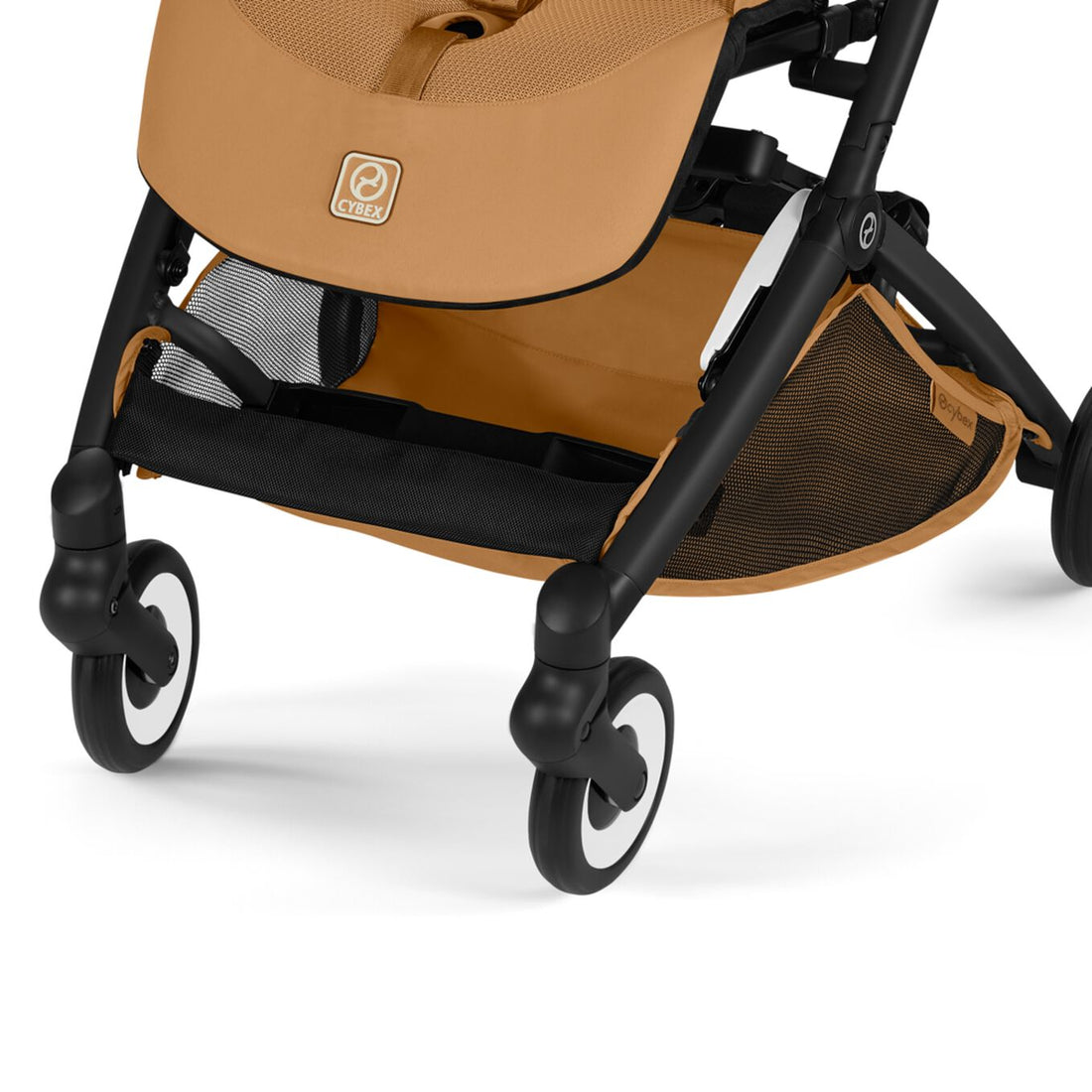 Cybex Libelle Ultra-compact Stroller in Cinnamon Yellow with a close-up of the under-seat shopping basket