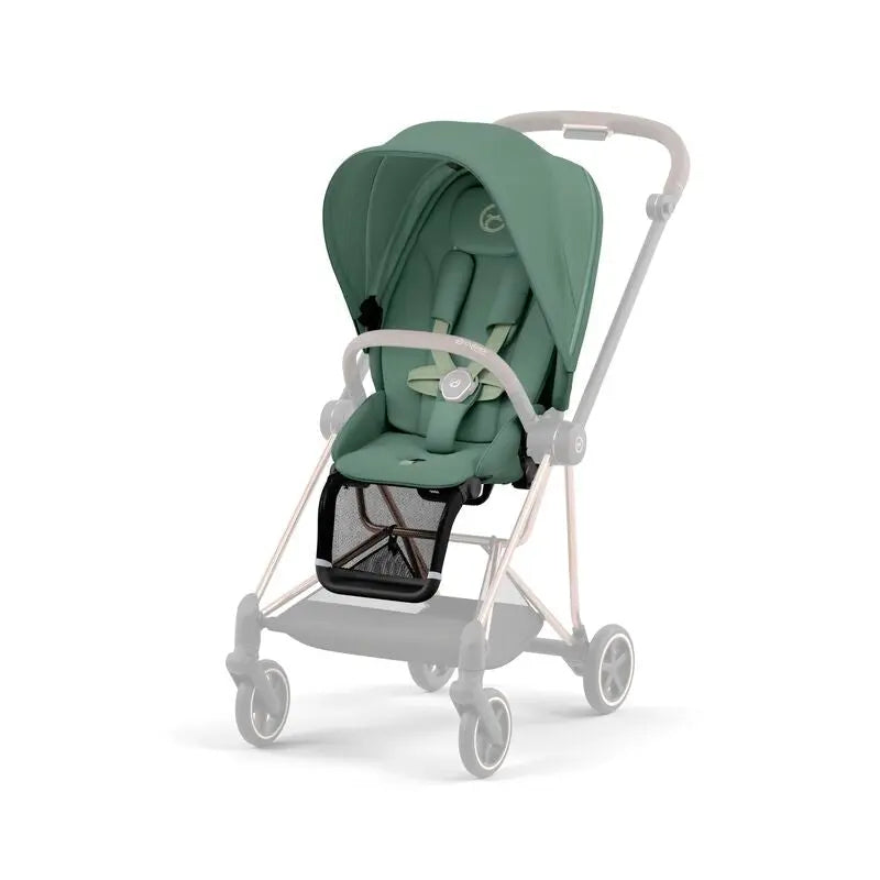 Close-up of the Cybex Mios3 Seat Pack in green fabric on a slim stroller with canopy and front basket.