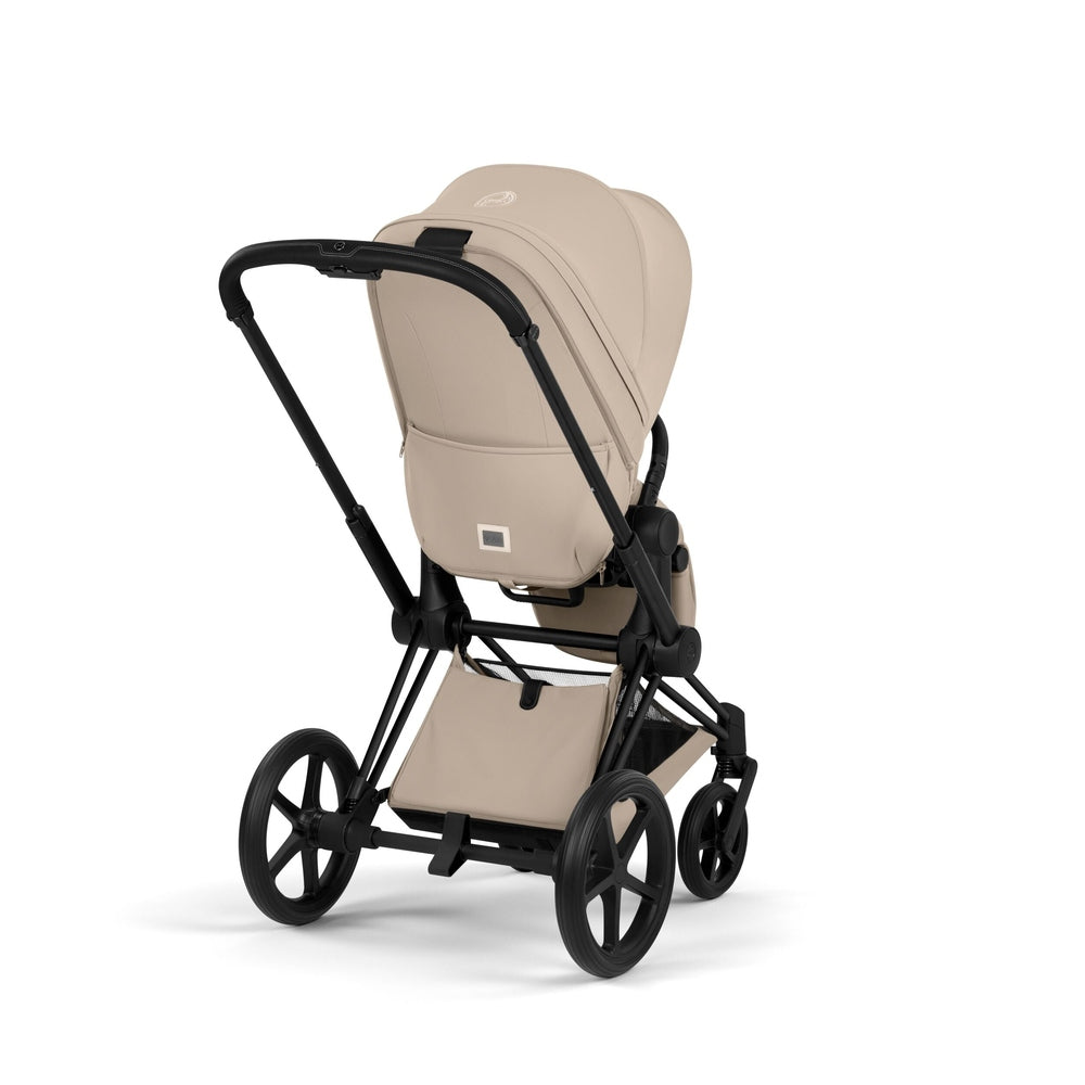 Cybex Platinum Priam 5 Luxury Stroller in light beige, rear three-quarter view showing seat back and frame.