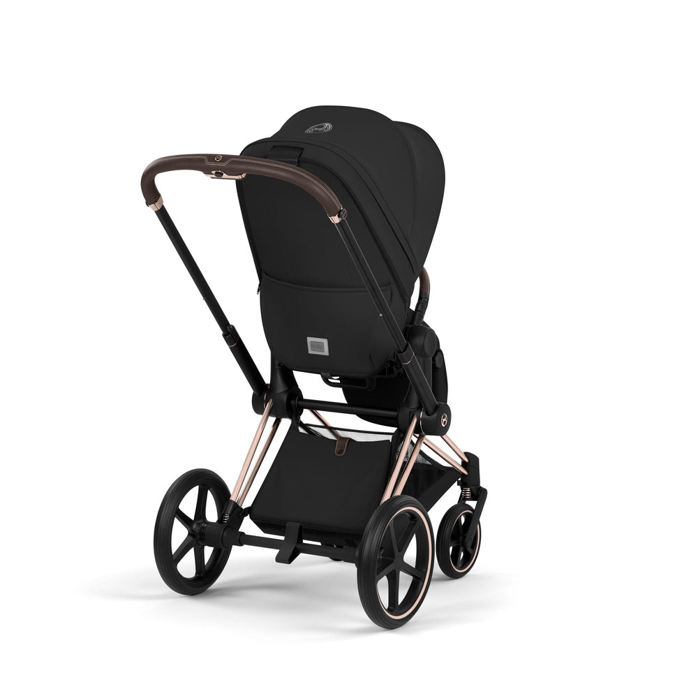 Cybex Platinum Priam 5 Luxury Stroller in sepia black, rear three-quarter view showing seat back and frame.