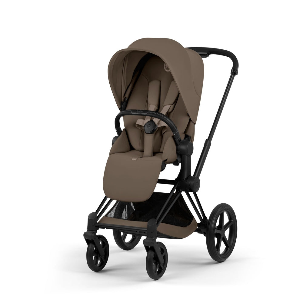 Cybex Platinum Priam 5 stroller with Matte Black frame and Coconut Brown Lux Seat, front three-quarter studio view