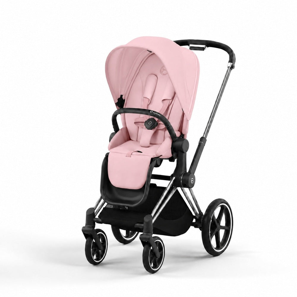 Studio product image of the Cybex Platinum Priam 4 Luxury Stroller in blush pink with chrome frame, front three-quarter view on white background.