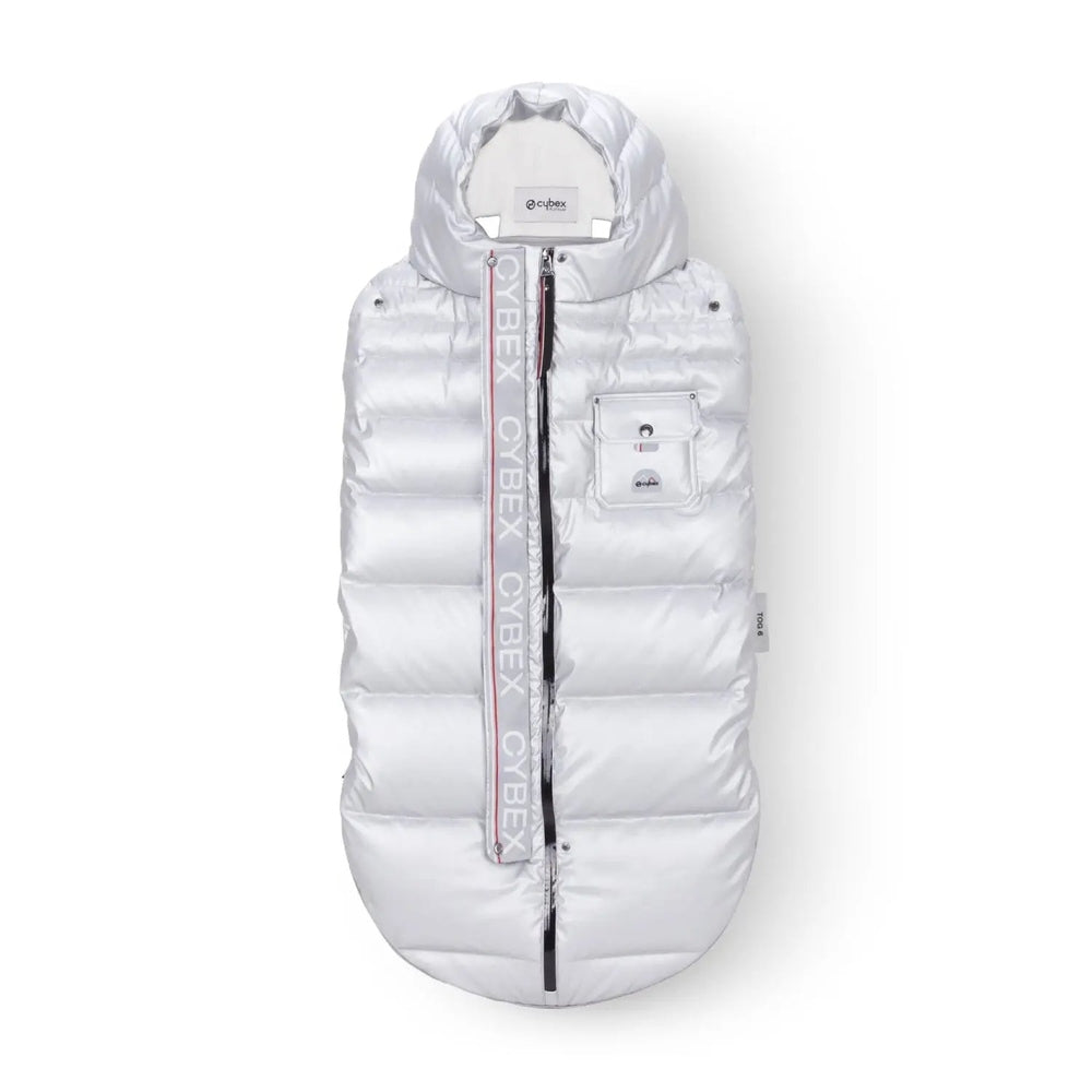 Close-up of the Cybex Winter Footmuff in white quilted insulation with hood, full-length zipper, and front pocket.
