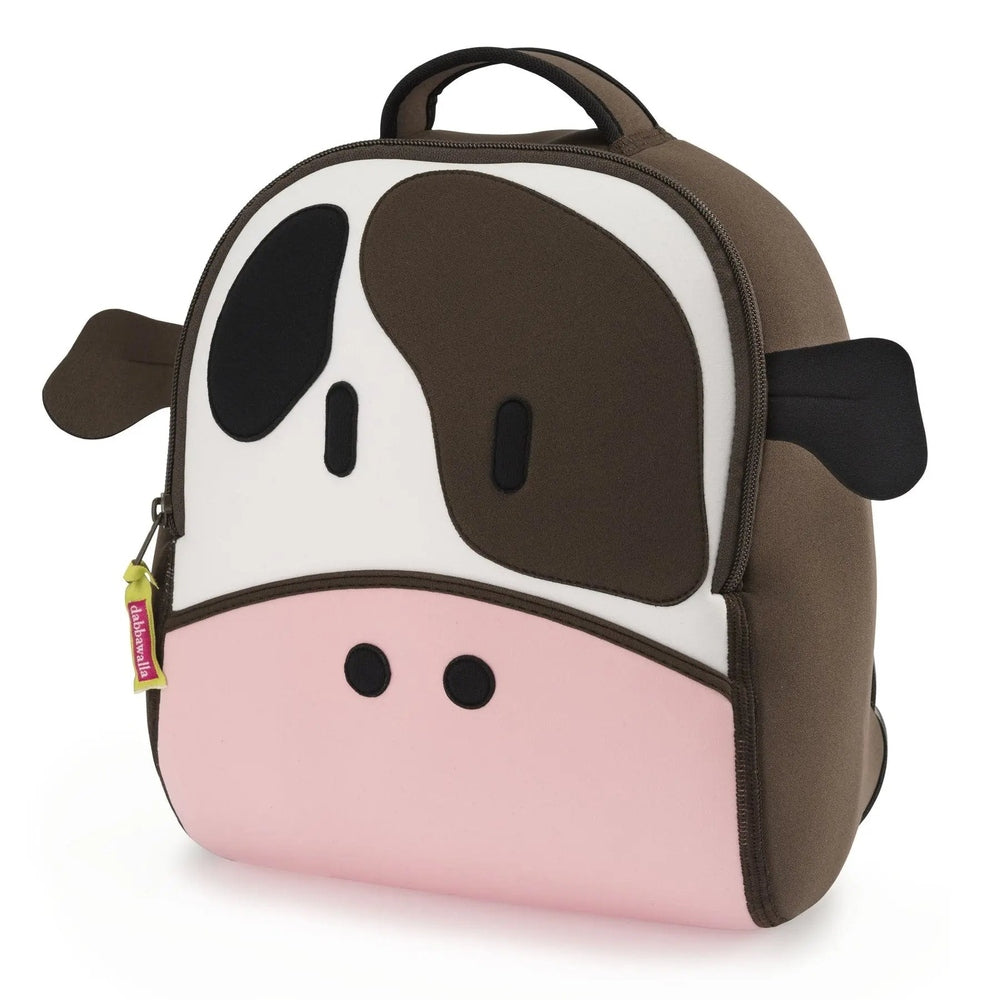 Dabbawalla Harness Backpack cow print in brown, white and pink with adjustable straps and top handle